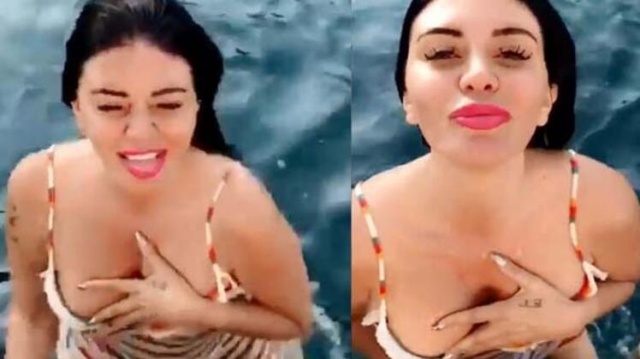 Ebru Polat elbiseyle denize girdi 5