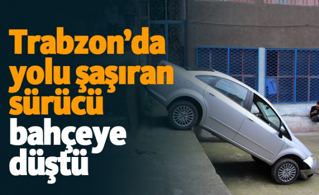 Trabzon’da yolu şaşıran sürücü bahçeye düştü 1