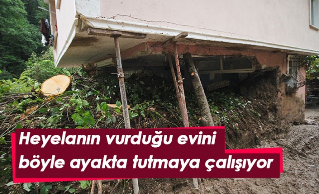 Heyelan vuran evini demir çubuklarla ayakta tutmaya çalışıyor. 1