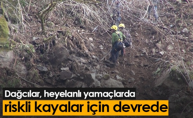 Dağcılar, heyelanlı yamaçlarda riskli kayalar için devrede. Foto Haber 1