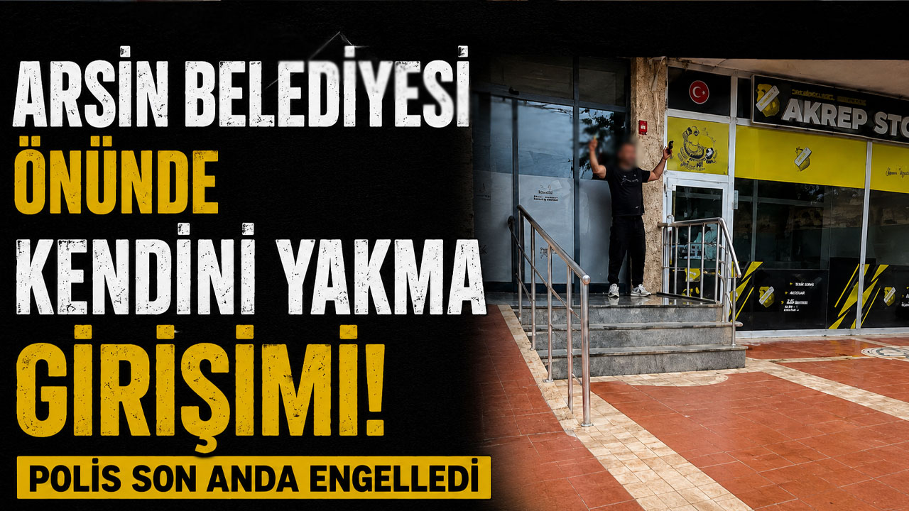Arsin Belediyesi önünde kendini yakma girişimi! Polis son anda engelledi