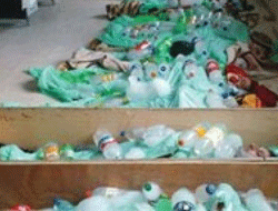 Suriye'de cesetlere buz şişeleri