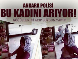 Göğüslerini açtı soygun yaptı