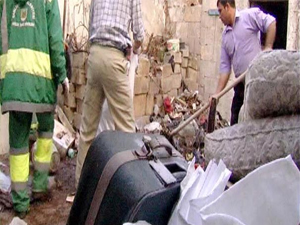 Evinden 15 kamyonet çöp çıktı!