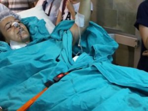 Yaralı doktor teşhisini kendi koydu: Karnımı açın