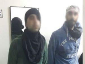 Kadın kılığındaki yakalandılar