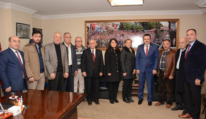 Genç'ten MHP'ye ziyaret