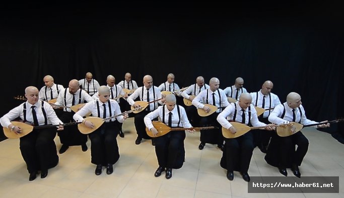 Sazdan adam ekibi lösemiye dikkat çekmek için saçlarını kazıtıp klip çekti