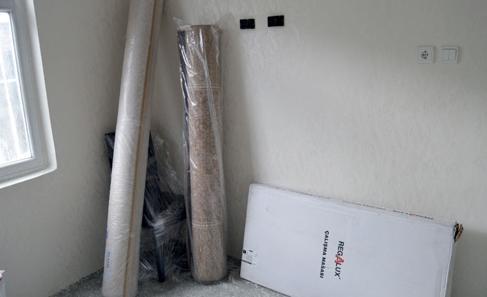 Evi yanan aileye Merinostan yardım eli