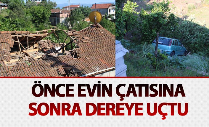 Önce evin çatısına sonra dereye uçtu