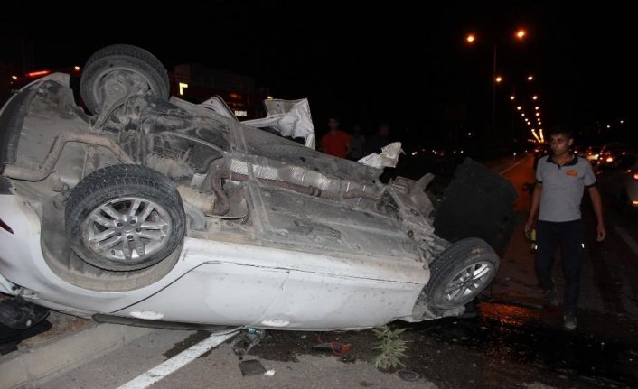 Otomobil taklalar attı, burnu bile kanamadan içinden  çıktı