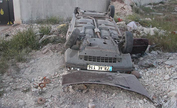 Takla atan otomobilden yaralı kurtuldu