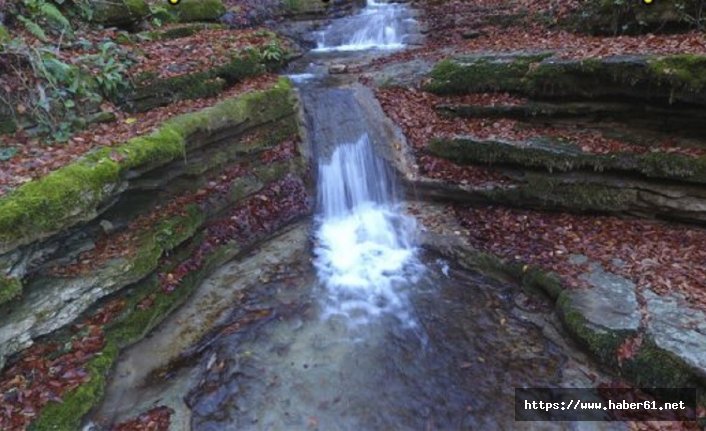 Tatile gittiler şelalede mahsur kaldılar