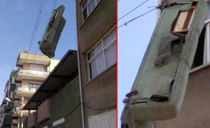 Elektrik tellerine takılan koltuğu itfaiye indirdi!
