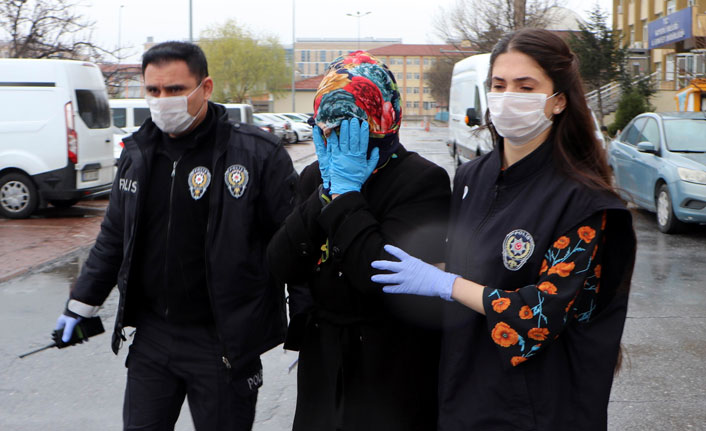 Elindeki sıvıyı asansör ve kapılara süren kadın adliyeye sevk edildi