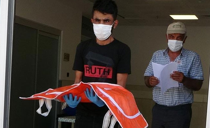 4 aylık bebeğinin cenazesini kucağında taşıdı