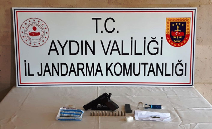 Ruhsatsız tabanca ve uyuşturucu ele geçirildi