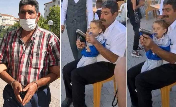 Emzikli torununun eline silah verip ateş ettirdi!
