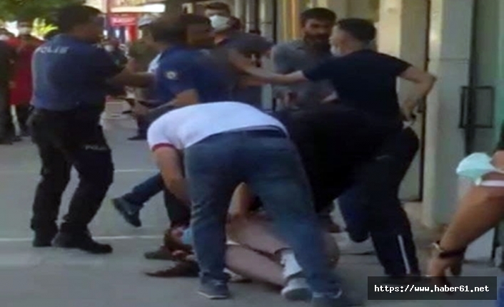 Sokak ortasında kadının başına silah dayayan iki asker gözaltına alındı