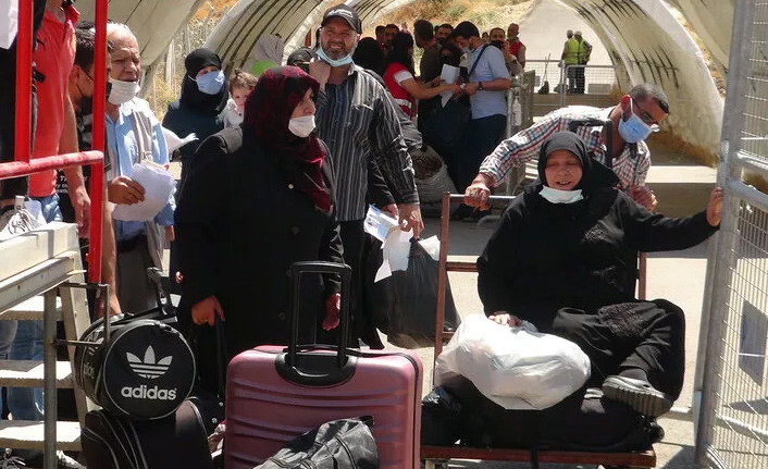 Suriyeliler, ülkelerine gitmeye başladı