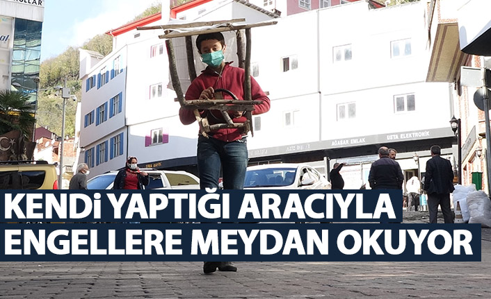 Kendi yaptığı aracı ile engellere meydan okuyor!