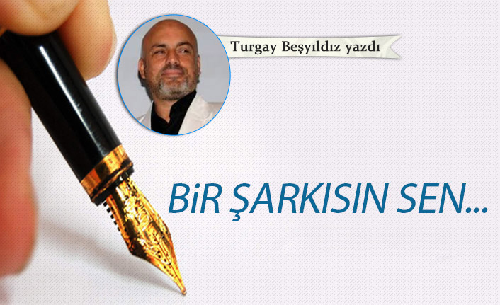 Bir şarkısın sen...