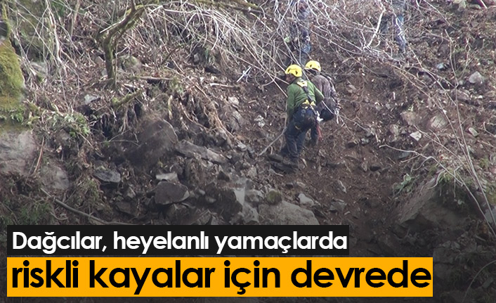 Dağcılar, heyelanlı yamaçlarda riskli kayalar için devrede