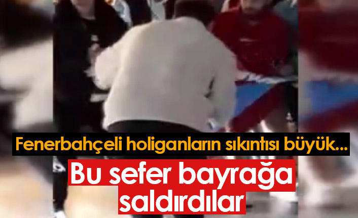 Fenerbahçeli holiganlar Trabzonspor bayrağına saldırdı