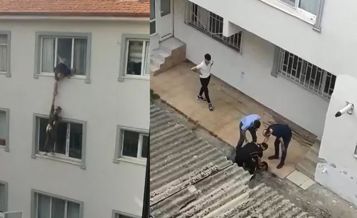 Polisten kaçarak pencereden sarkan şüpheli mahalleliyi şaşkına çevirdi