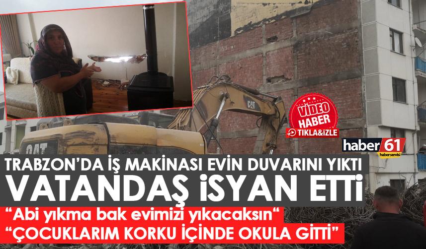 Trabzon’da iş makinası yan binanın duvarını yıktı! “Abi yıkma bak evimizi yıkacaksın“ dedi ama…