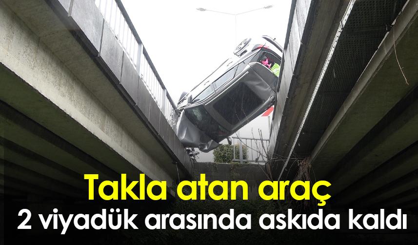 Rize'de takla atan araç 2 viyadük arasında askıda kaldı
