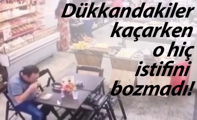 Dükkandakiler kaçarken o hiç istifini bozmadı!