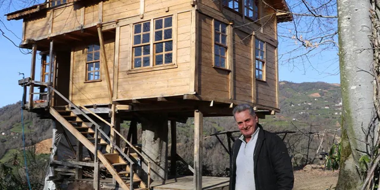 150 yıllık ağacın gövdesine 2+1 ev yaptı