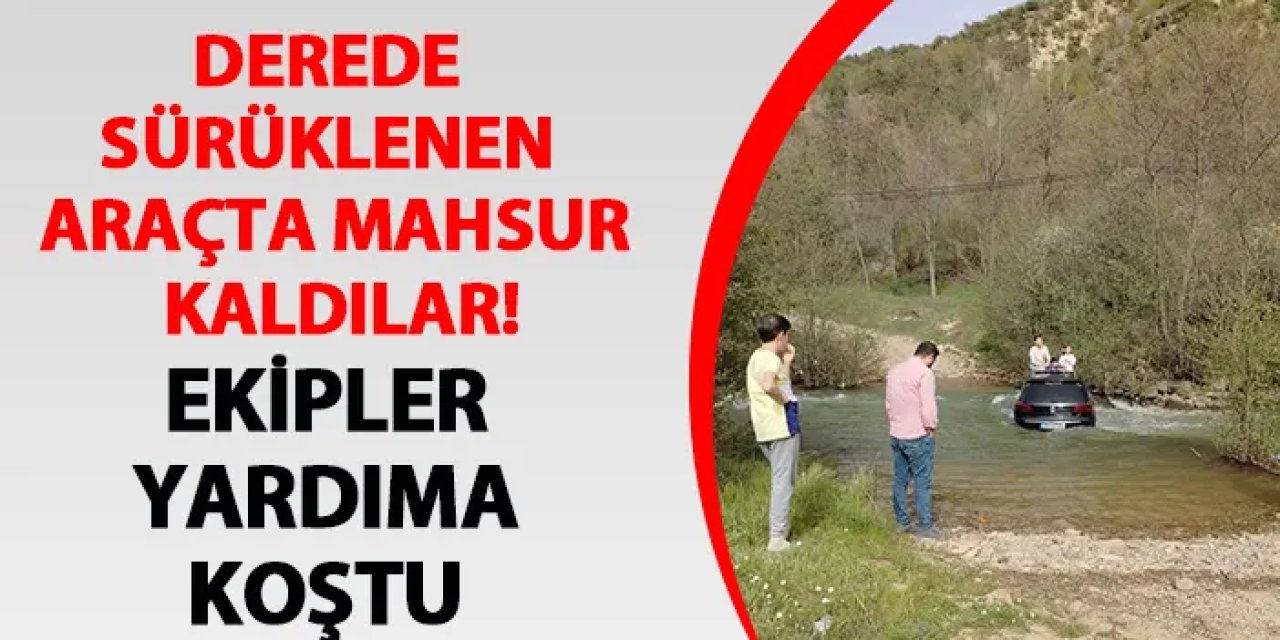 Giresun'da derede sürüklenen araçta mahsur kaldılar!