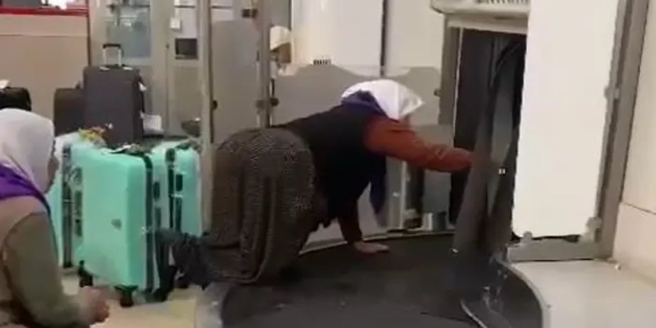 Adana havalimanı’nda izdiham! Valizlerin üzerine çıktılar