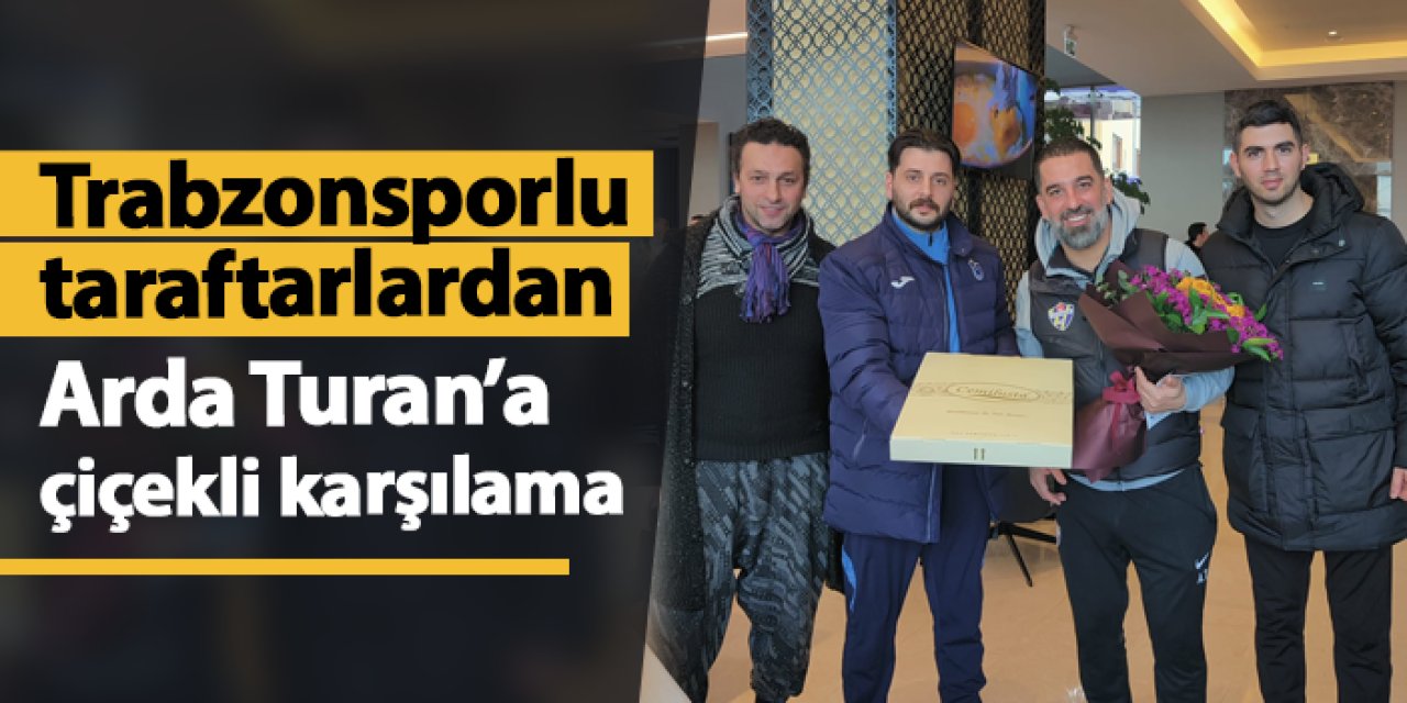 Trabzonsporlu taraftarlardan Arda Turan'a çiçekli karşılama!