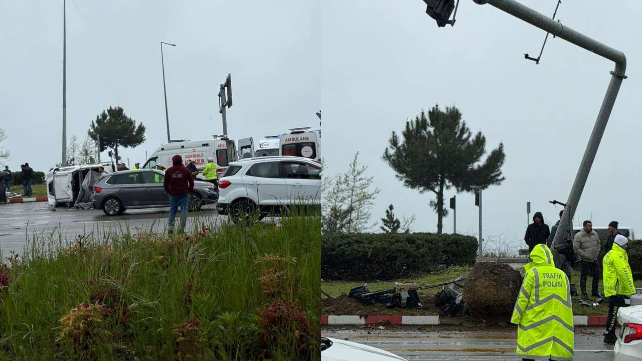 Otomobil trafik ışığı direğine çarparak takla attı