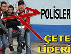Çete lideri polislerin kucağında