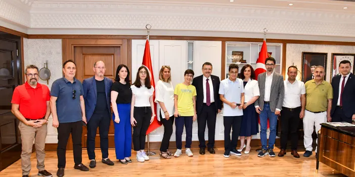 Başkan Genç şampiyonları ağırladı